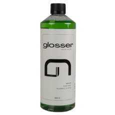 Transparent flaska med svart skruvkork för Glosser Smooth vaxfritt skumschampo. Innehållet är grönt.